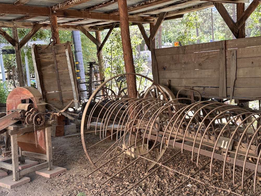Old farming equipment, now rusted.